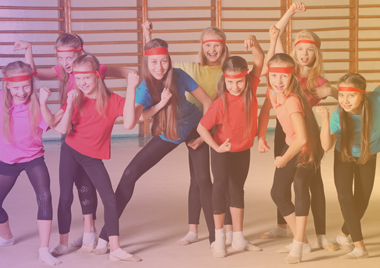 martial arts class in Litchfield and Staffordshire group of young girls ready to learn defence wearing red headbands